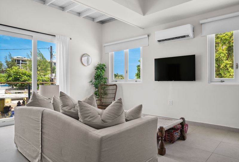 Bright and airy living space, perfect for movie nights or lounging.