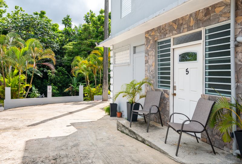 Quaint patio perfect for morning coffee.