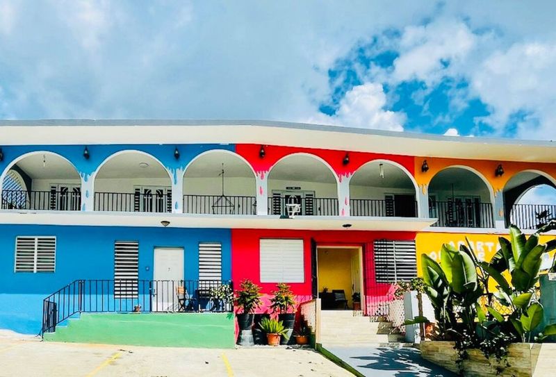 Welcome to your vibrant retreat! Our eye-catching building boasts a unique and colorful facade, making it easy to spot and inviting to arrive at.