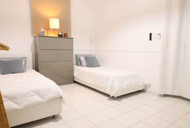 Bright, airy, and spacious, this room offers two beds for a restful night's sleep.