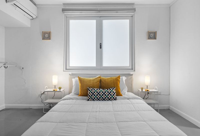 Condado | Family Vacation Rental 3 Elegance & Ease: Wrap yourself in the comfort and sophisticated style of this bedroom, where every detail contributes to a luxurious and calming atmosphere.