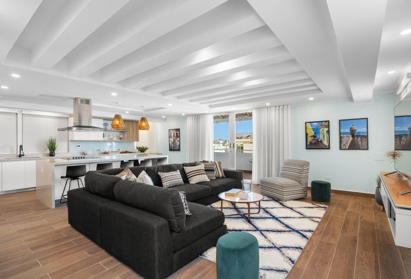 Step into comfort and style in our spacious living room with modern décor!