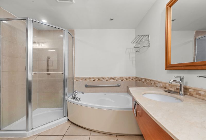Indulge in relaxation with our luxurious corner soaking tub, perfect for unwinding after a day of exploring San Juan. It's your private spa retreat.