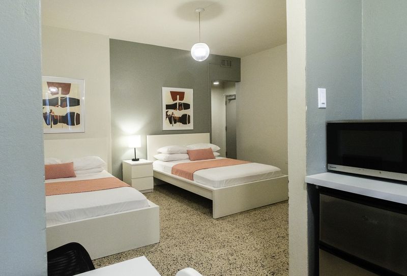 Settle into a peaceful night's sleep in this tranquil bedroom. The soft lighting and comfortable bedding are perfect for unwinding and recharging.