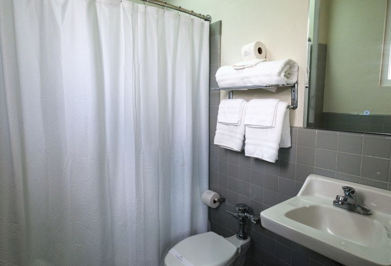 Our spotless bathroom is fully equipped with fresh, fluffy towels and all the essentials, ensuring a clean and comfortable experience for every guest.