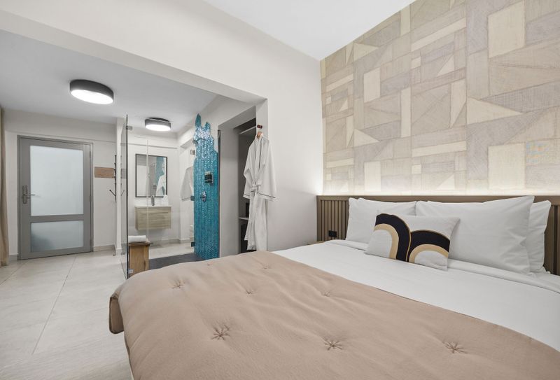 The perfect place to relax after a day of exploring, this bedroom features a luxurious queen-size bed.