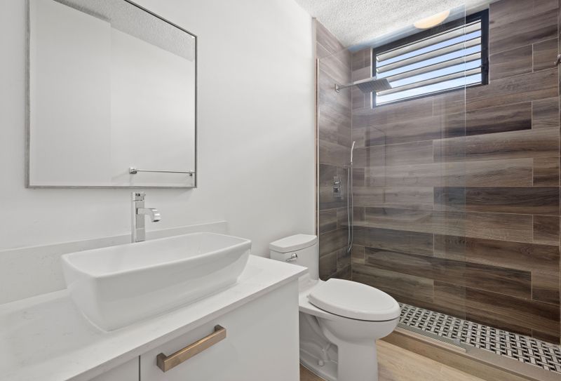 Sink into comfort and style in our immaculate washroom retreat.