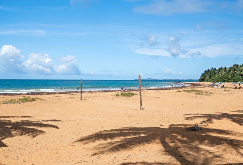 Your Private Slice of Paradise: This breathtaking beach view is just moments from your door – an idyllic setting for sunbathing, swimming, and unforgettable sunsets.