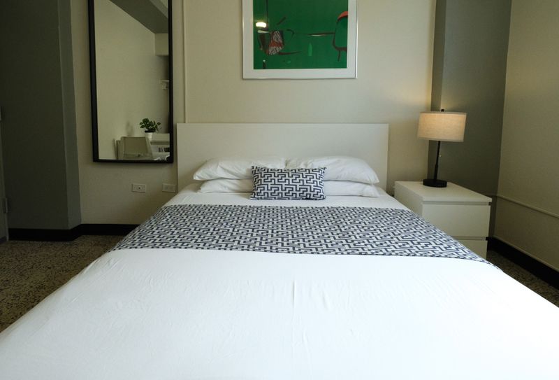 Everything you need for a fresh start. This well-maintained bathroom features a neat layout, plenty of towels, and a clean environment for your comfort.