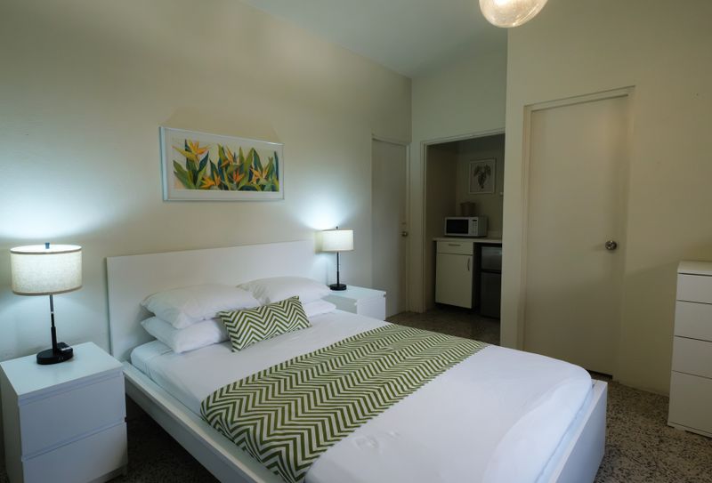 "Self-Contained Comfort: Experience the best of both worlds – a cozy queen bedroom and the practicality of a small kitchenette, offering you independence and convenience.