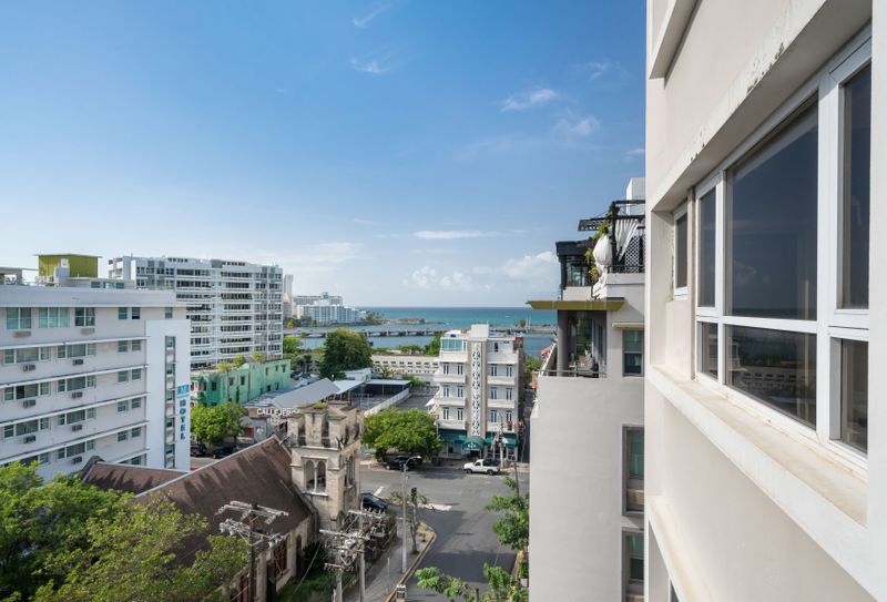 Enjoy the vibrant city life from your private balcony, offering a refreshing view of the surrounding architecture and a glimpse into the local ambiance.