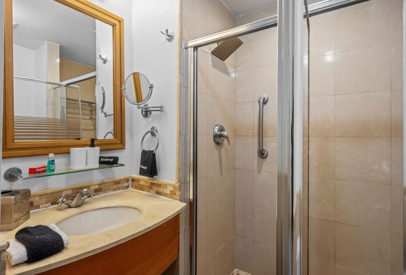 Refresh and rejuvenate. Our sparkling clean bathroom features a spacious walk-in shower with a rain showerhead, perfect for washing off the day's adventures.