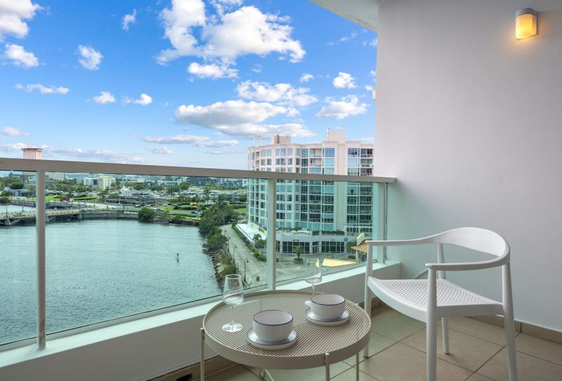 Entrance of balcony revealing a glimpse of your comfortable and well-equipped space.