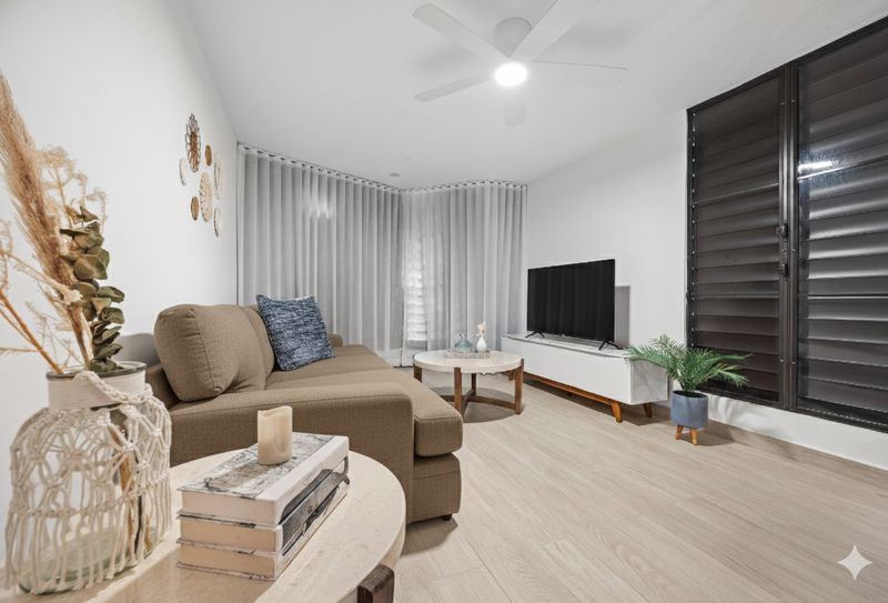 Elena | Beach Home 3 Relax in style! Perfect for movie nights or planning your day.