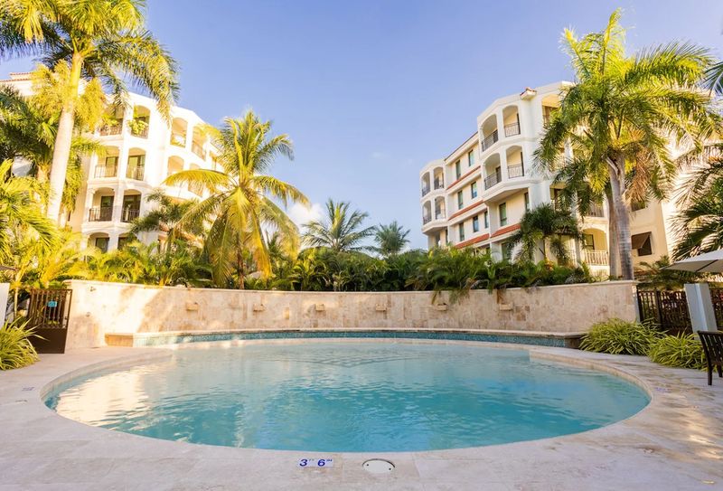 The sun reflects off the water's surface, inviting you to relax and enjoy its serene atmosphere.