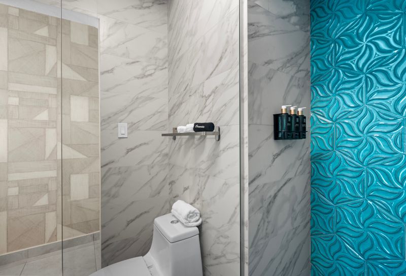 Indulgent bathroom experience, with a sleek design and a touch of luxury.