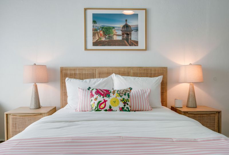A clean design with a large bed, tall ceilings, and stylish touches.