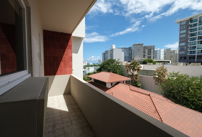 Private Balcony View. Enjoy fresh air and the urban vista of San Juan.