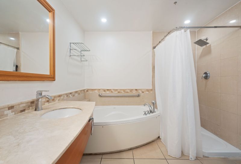 Spacious and elegant, our bathroom offers ample counter space and modern fixtures for your ultimate comfort.