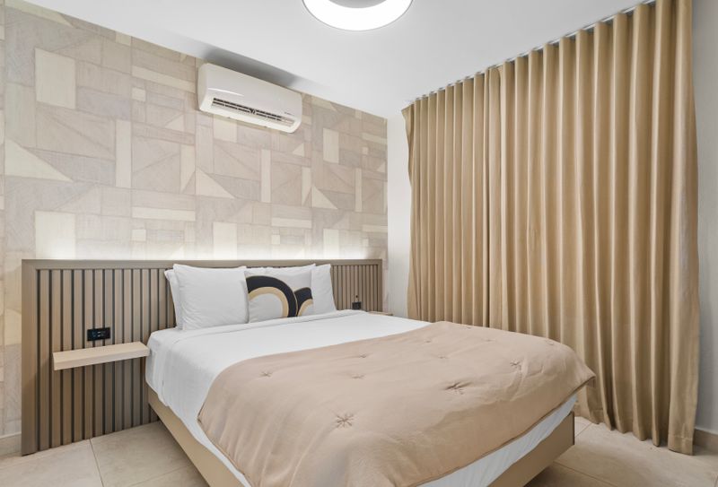 Escape the hustle and bustle in this stylish and peaceful room. Perfect for solo travelers or couples, it offers a comfortable bed, ample storage, and a calming atmosphere.