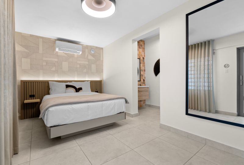 Modern room with a minimalist design, perfect for a relaxing stay.
