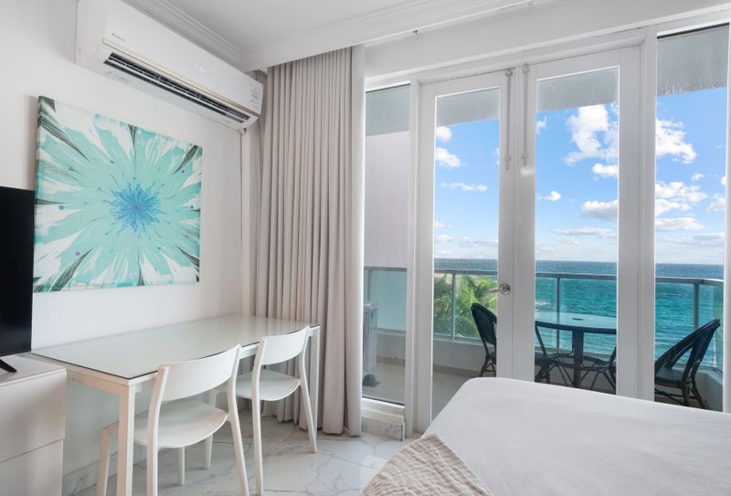 Your personal oasis awaits! Step onto the balcony and soak in the stunning blue waters and sky, perfect for morning coffee or evening sunsets.