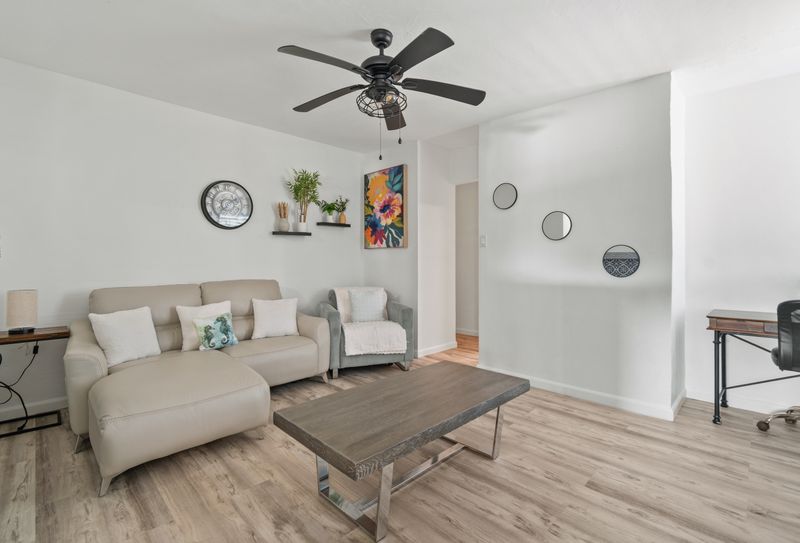 An inviting lounge with stylish furnishings and a sofa.