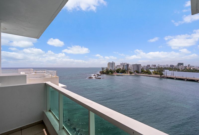 Your private sanctuary: step out onto the balcony and be mesmerized by the panoramic views of Condado Lagoon and the city skyline.