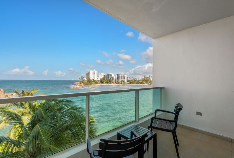 Your private balcony with sweeping ocean views & the vibrant San Juan skyline. Perfect for relaxing and soaking it all in.