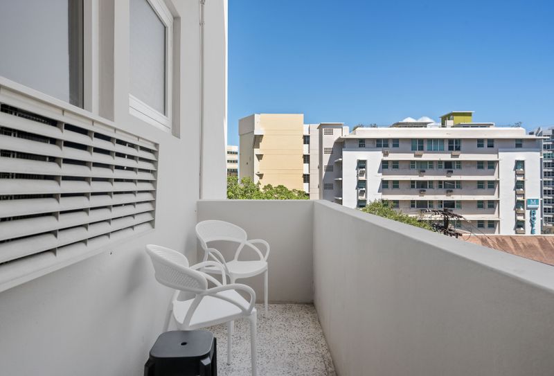 Enjoy the lively cityscape from your private balcony! It's the perfect spot to sip your morning coffee or unwind with an evening drink while taking in the views.