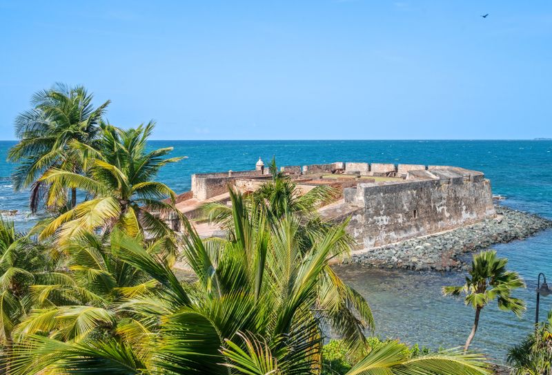 Witness the blend of heritage and nature from your raised balcony with a sea view.