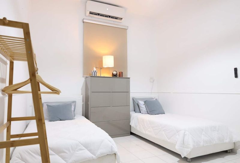 Two beds, one peaceful retreat — the ideal spot for relaxation and rest.