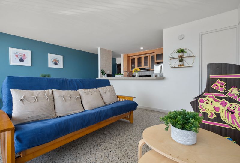 Cozy living space with comfortable blue sofa. Ideal for relaxation and making memories