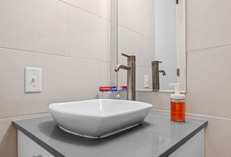 Stylish sink with a sleek, modern faucet.