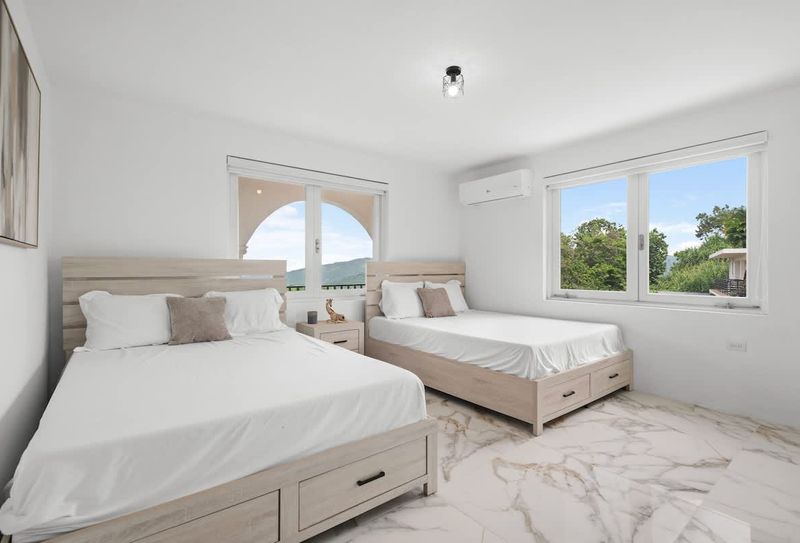 A serene bedroom with a calming neutral color palette.