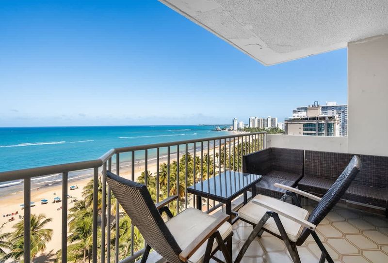 Wake up to paradise! Your private balcony offers breathtaking panoramic views of the sparkling turquoise ocean and golden sands, perfect for your morning coffee or evening cocktails.