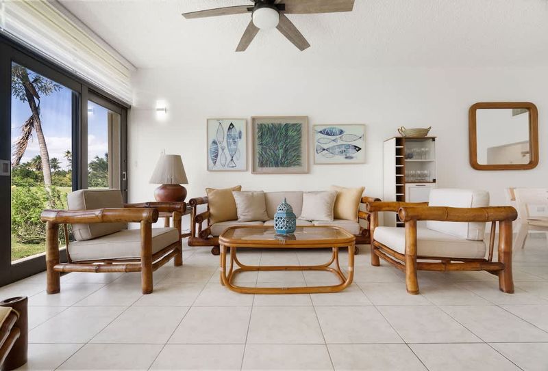 Beachfront Oasis | Coastal Vacation Rental 3 Lush furniture and stunning views create the ultimate space to unwind.