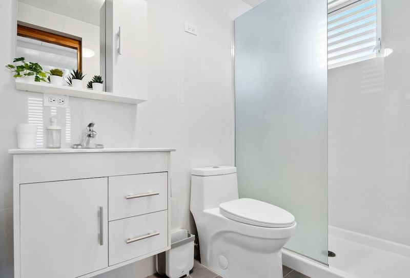 A pristine, clean bathroom with everything you need.
