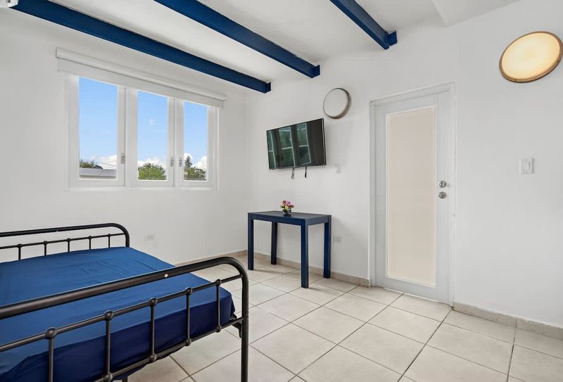 Comfortable bed and a TV for your entertainment.