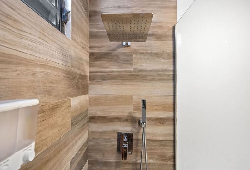 Elena | Beach Home 4 modern bathroom with rainshower