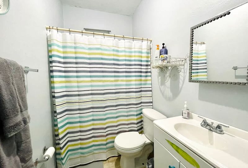 Spacious Eco Retreat | Solar-Powered 4 Refresh and rejuvenate! Our clean and modern bathroom features a spacious shower, ensuring a comfortable and invigorating start or end to your day.