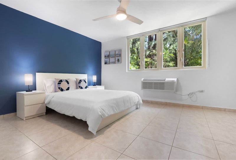 Drift into a peaceful night's sleep in our serene bedroom, designed for ultimate relaxation. Sink into the comfortable queen-size bed after a day of sun and exploration.