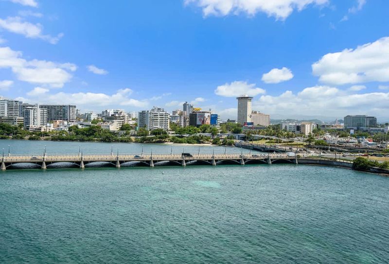 Experience breathtaking panoramic views of the shimmering Condado Lagoon and the vibrant San Juan skyline, a true feast for the eyes.