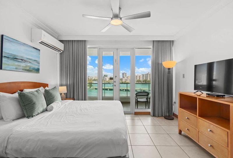 Wake up to breathtaking lagoon views from your comfortable bed, a truly serene experience.