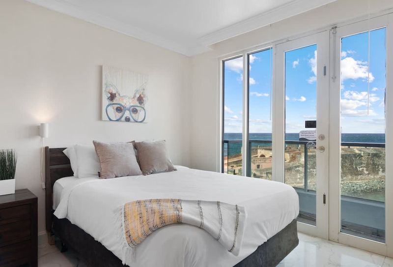 Your cozy corner. Relax in a comfortable double bed with views of the sea.