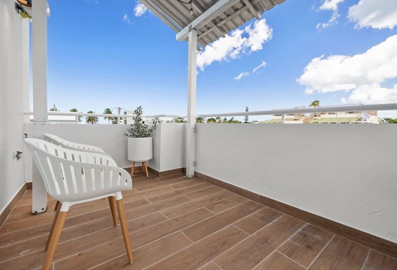 Elena | Holiday Rental 4 balcony with vews, white chair