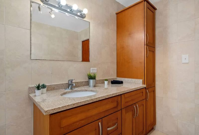 Functional and clean, this bathroom has everything you need.