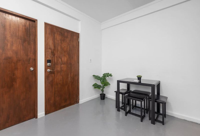 Tasteful Dining Experience: Gather around this stylish dinner table, designed for comfort and conversation, offering the perfect setting to savor delicious meals in a contemporary and inviting atmosphere.