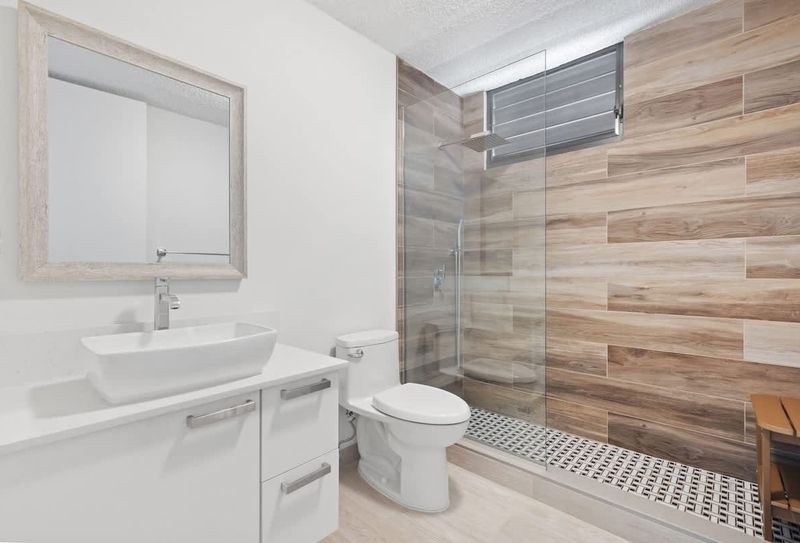 A clean and tidy bathroom, designed for your convenience and comfort.