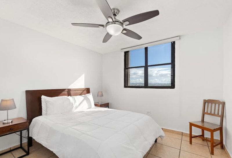 Serene bedroom with stunning views, perfect for unwinding.